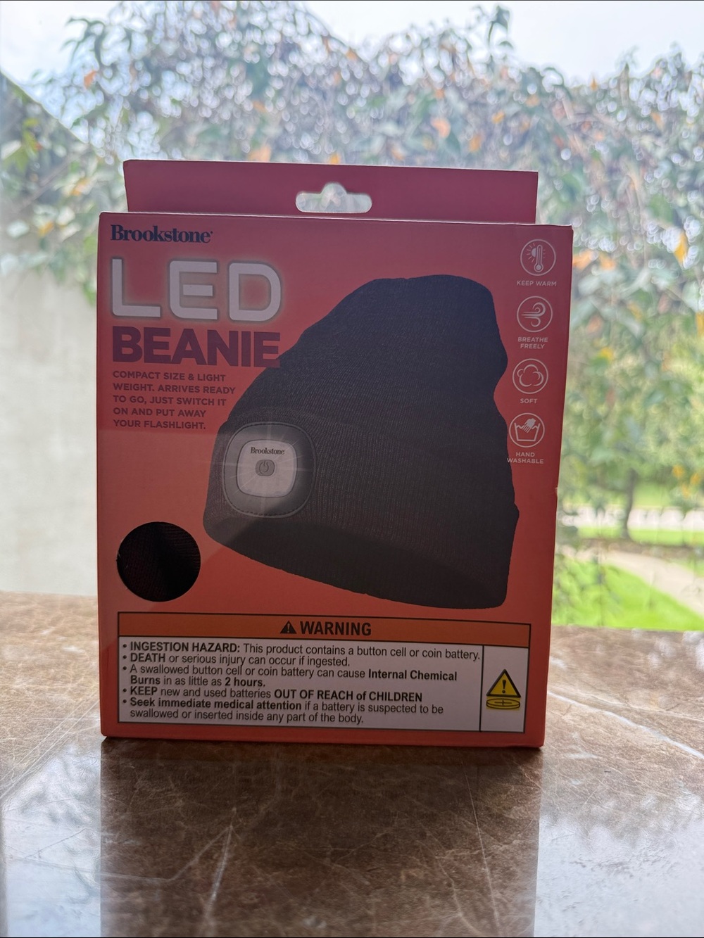 Brookstone LED Beanie - Black and Red Packaging